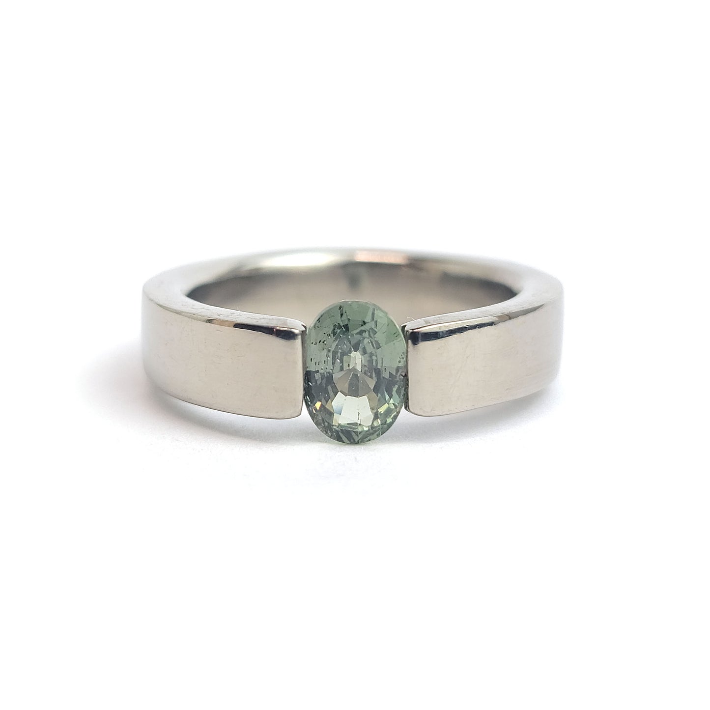 Titanium ring - green sapphire